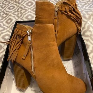 Brown booties that has been worn twice comes with box